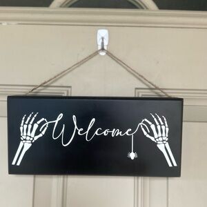 Black and White Skeleton Welcome Sign